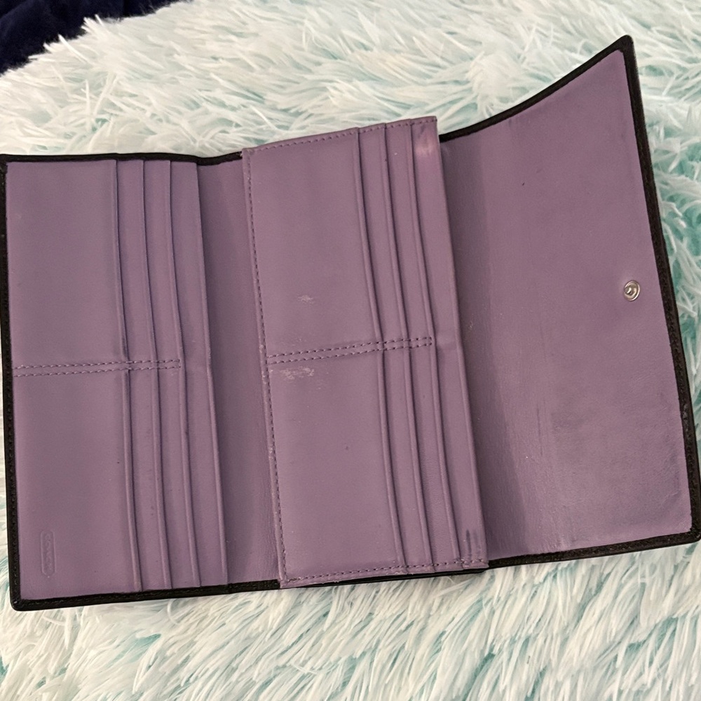Coach Black Leather Clutch Wallet - the interior is a pretty purple.